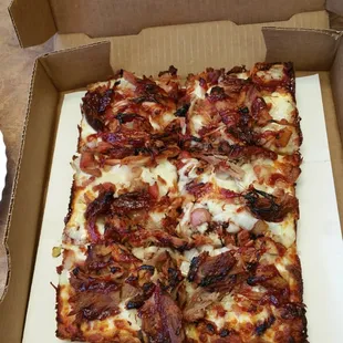 Pulled pork pizza ($9.99 small square pizza). Delish!