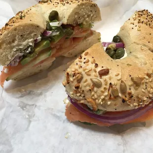 Smoked salmon, cream cheese, cucumber, capers, tomatoes, and added avocado on an everything bagel. Craving fulfilled. :)