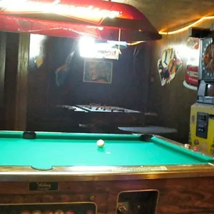 a pool table with a pool ball on it