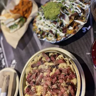 Brisket nachos  Mac and cheese with brisket  Grilled chicken sandwich -The Balk