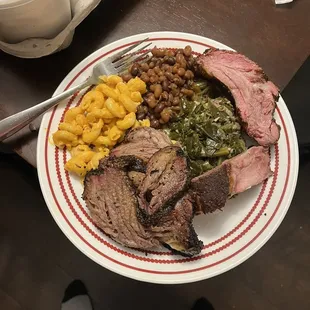 Brisket, ribs, jalapeño Mac'n Cheese, greens and baked beans