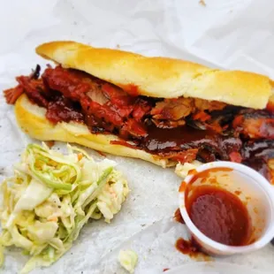 Chopped brisket sandwich with a side of Cole slaw