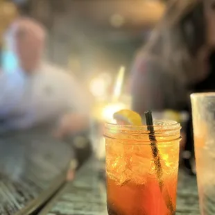 a drink in a mason jar