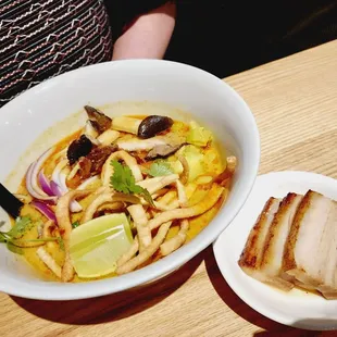 Khao soi with pork belly on side