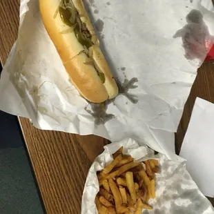 Cheesesteak sandwich and fries