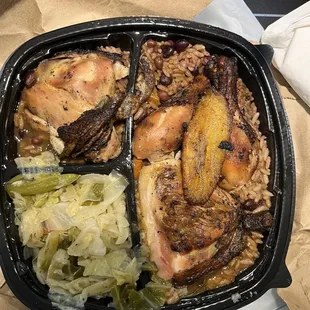 Jerk chicken and beans and rice and cabbage