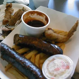 3 Hot Links &amp; 3 wing combo for $9.75.  No mention on sign, but fries &amp; small slaw come with it.  Very tasty!