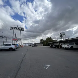 a parking lot with cars parked in it