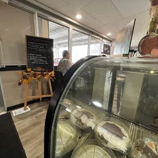 a bakery with a display of pastries