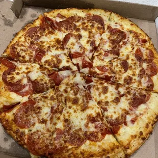 Signature Pepperoni with Extra Cheese.  Garlic Butter Crust