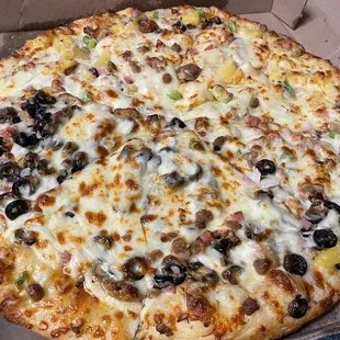 Supreme plus black olives on the other half