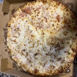 Half cheese and half grilled chicken large pie $12
