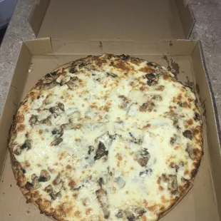 Mushroom pizza with extra cheese