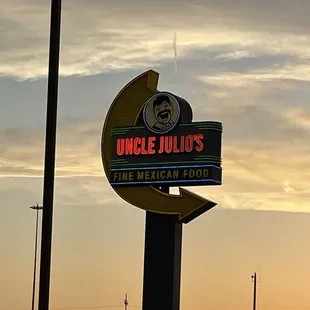a neon sign for uncle julio's