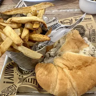 Homemade chicken salad on a croissant and homemade fries. Deliciousness!