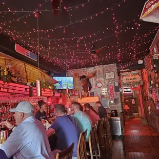 people sitting at a bar