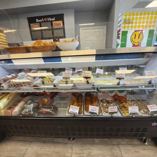 a display case filled with baked goods