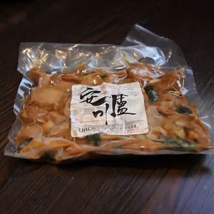 a bag of chinese food on a table