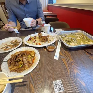 Sour pickle soup on the right in the tray