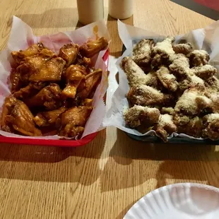 18 mild, 18 garlic parm and a $20.00 bill. Covers tip and all!!! You can't beat it