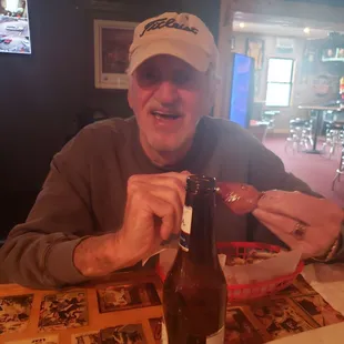 Paul enjoying his sweet bbq wings!