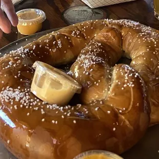 1.5 pound delicious pretzel with cheese and mustard