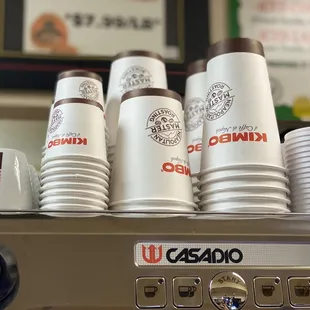 a stack of coffee cups