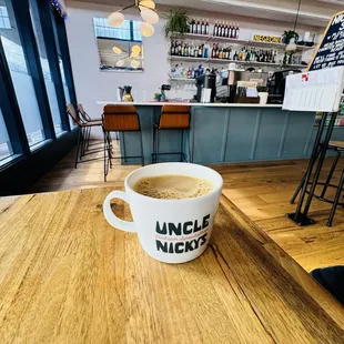 a cup of coffee on a table