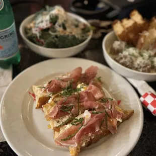 Classico Pane Tostata, Kale salad, and Uncle Nicky&apos;s Meatballs