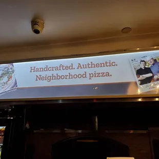 a sign for uncle paul&apos;s pizza