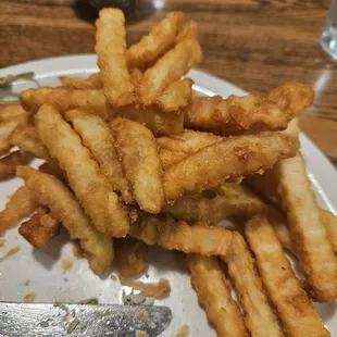 Dark brown, doubl-cooked fries.  Gross