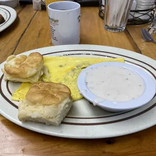 Biscuits and gravy and meat &amp; cheese omelette