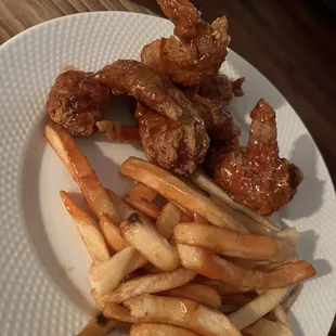 fried chicken wings and french fries