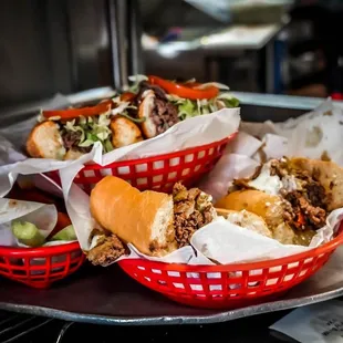 two baskets of food on a tray