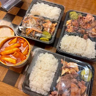 Chicken teriyaki, beef (bulggogi) bento box and ddukboki (Korean spicy rice cake)