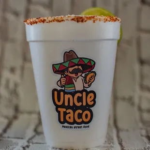 a cup with a drink in it