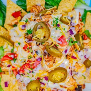 a close up of a plate of nachos