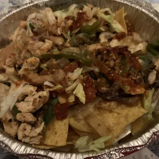 Chicken and steak fajita nachos