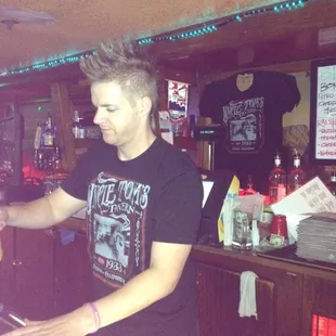 a bartender at the bar