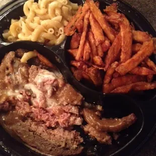 Meatloaf platter (raw/undercooked in center) with 2 sides (sweet potato fries &amp; mac-n-cheese).  Sweet potato fries are delish!