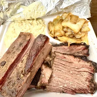 Smoked Ribs Combo (Costillas) and smoked brisket with potato salad and cabbage. Didn't need sauce