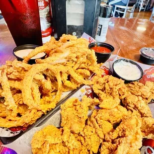 A &apos;small&apos; appetizer of fried oysters with a &apos;side&apos; of their homemade onion rings!