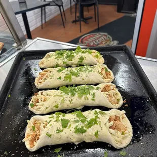 a plate of burritos