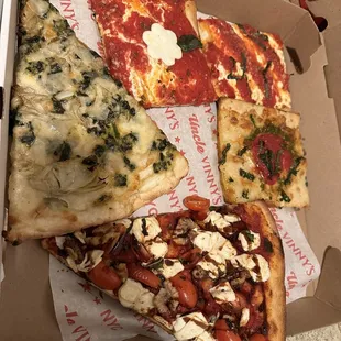 Assorted pizza slices