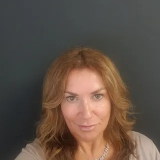 Corinne F.
