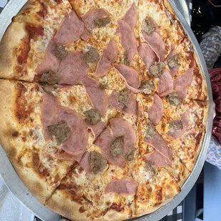 Regular pizza with sausage and Canadian bacon. Very tasty!