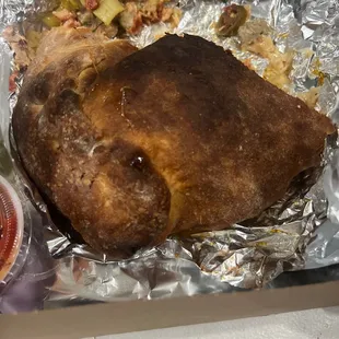 That's a calzone ??  We have been going there and it's been downy...last straw