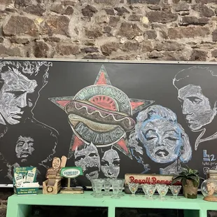 Chalkboard behind the register.