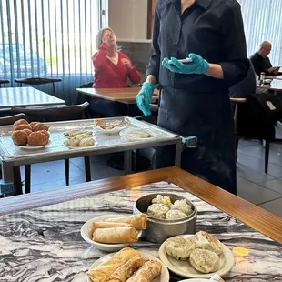 a woman serving food