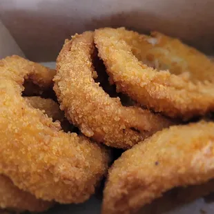 fried onion rings in a basket